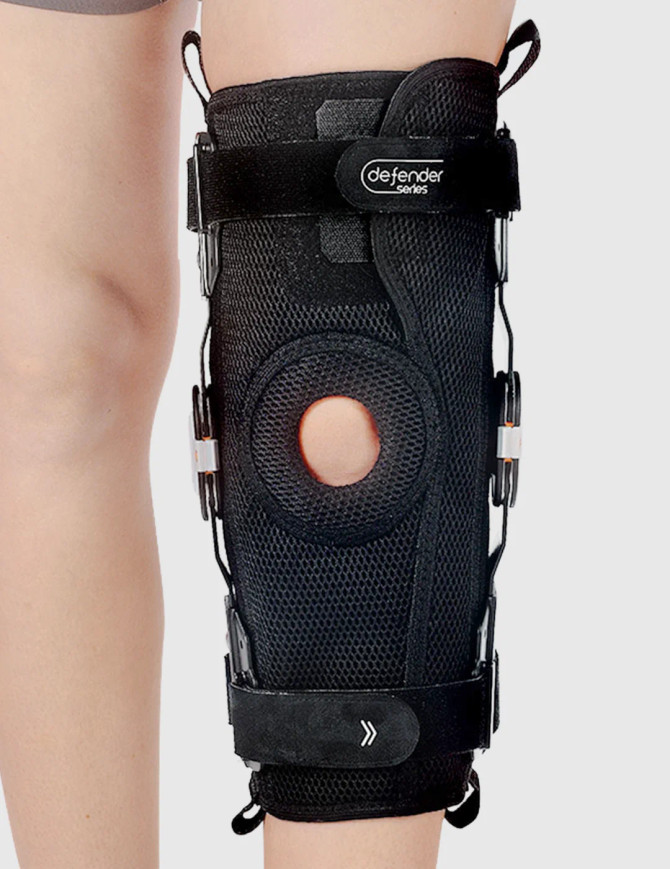 Breathable mesh construction and cushioned padding support comfort during extended wear.