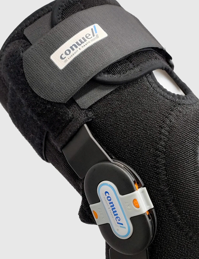 Front view of the Conwell Medical 5755 knee brace highlighting adjustable straps, secure hook and loop fasteners and supportive frame