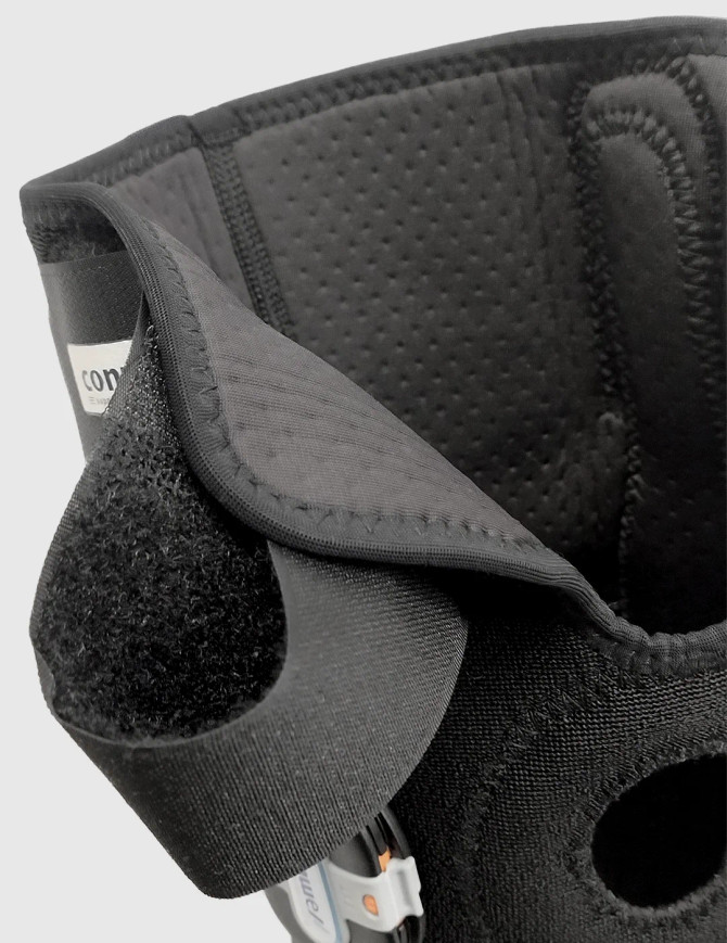 Interior view of the Conwell Medical 5755 knee brace showing breathable COOLMAX® fabric lining for comfort