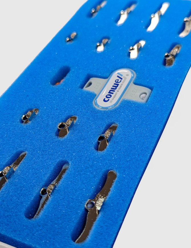 Conwell Medical 5755 ROM hinge components, in their casing