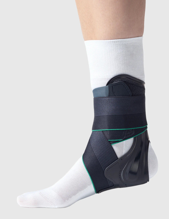 Detail view of rigid outer shell and heel support on Push med Aequi Flex brace designed to control ankle inversion and eversion.