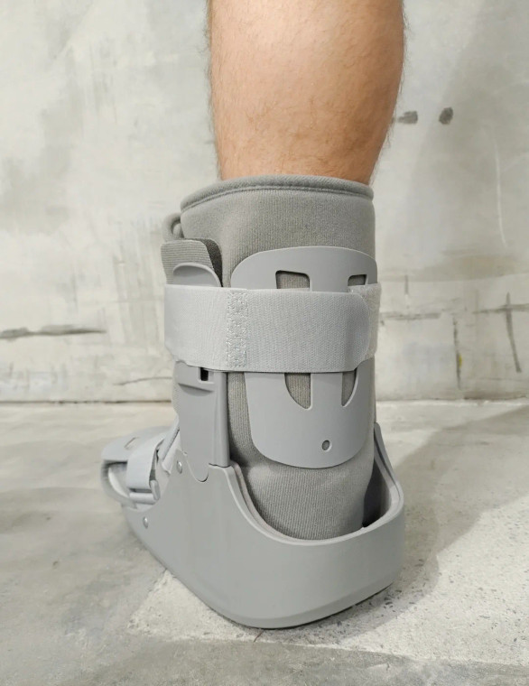 Ankle walker with soft foam lining and breathable fabric for improved comfort during extended wear