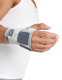 Side view of supportive wrist brace showing structured splint panel and comfortable wraparound design for joint stability.