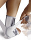 Rear view of ankle support brace highlighting heel lock design and wraparound strap system for enhanced joint stability.