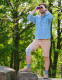 Person standing outdoors wearing Push care Knee Brace, illustrating stability and confidence during movement