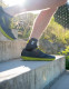 Ankle brace in use during outdoor jogging, offering secure support without restricting movement
