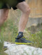 Lightweight ankle support worn during walking to provide stability and comfort on varied terrain