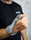 Conwell Medical 5325/5326 plastic thumb splint worn on the hand, showing thumb and wrist immobilisation support