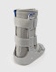 Rear view of paediatric walker boot showing rigid shell, padded lining, and adjustable straps for secure foot and ankle immobilisation.