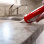 Red Devil 0405  Kitchen & Bath Siliconized Acrylic Caulk 5.5 FL. OZ. Squeeze Tube White Image 4