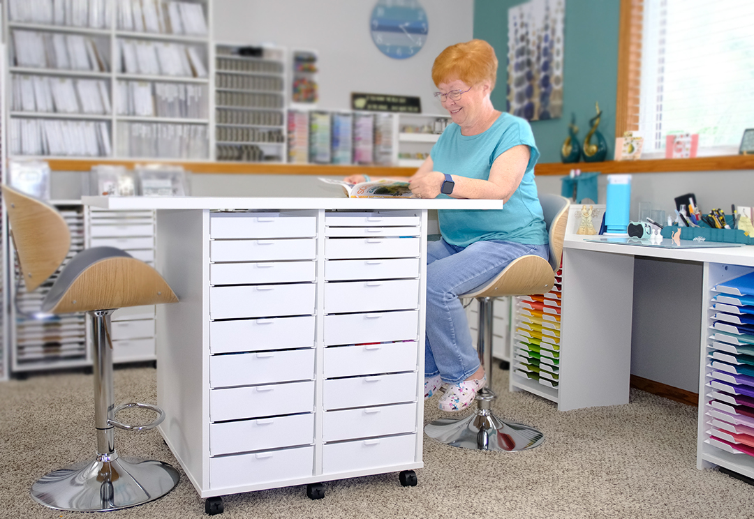 BCO Craft Island in an organized craft room alongside cabinets