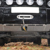Britpart Sump Guard for Discovery 3, front view of vehicle's underside showing the sump guard installed to protect the engine's oil pan.