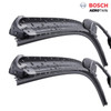 BOSCH Aerotwin Flat Blade Wiper Blade Set 600/400mm, pair of black wiper blades with water droplets on the blades. BOSCH Aerotwin Flat Blade Wiper Blade Set 600/400mm, pair of black wiper blades with water droplets on the blades.