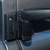 Britpart Door Hinge Kit - DA1305, close-up view of black door hinge with mounting screws on a metallic vehicle surface.
