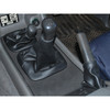Britpart Handbrake Lever Gaiter for Discovery 1/2, close-up image of the black leather gear stick gaiter on a vehicle's handbrake lever.