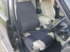 Terrafirma Tactical Seat Cover Car Tidy Storage System, black seat cover protecting the car seat and providing organized storage.