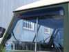Britpart Front Window Wind Deflectors DA6078 - Reduce Noise & Buffeting for Defender, installed on a defender vehicle front windows.