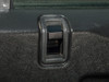 Britpart Locking Peg Black Anodised Aluminium for Defender, close-up view of the black anodised locking peg mounted on a vehicle's dashboard or panel.