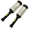Dunlop Pair of Dunlop Front Air Suspension Struts with Dampers for Discovery 3, black and silver shock absorbers with dampers for vehicle suspension.