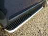 Direct Replacement Side Steps with OE Style Brushed Aluminium Trim (Pair) for Discovery 3/4, close-up of alloy side steps with black textured surfaces and Brush Aluminium accents on a gravel surface.