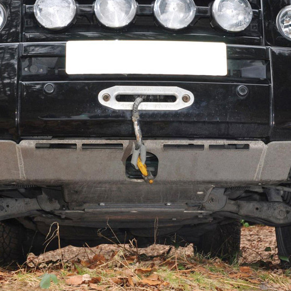 Britpart Sump Guard for Discovery 3, front view of vehicle's underside showing the sump guard installed to protect the engine's oil pan.