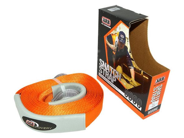 ARB 4X4 Accessories ARB Recovery Snatch Strap 8000Kg x 9 Metres, orange and gray recovery strap coiled beside its packaging box.