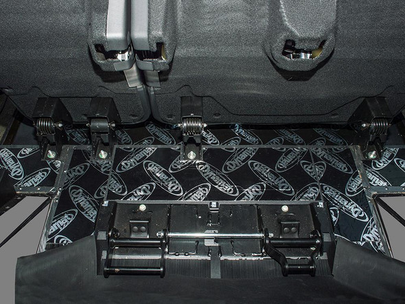 DYNAMAT Puma Dynamat Rear Under Seat Soundproofing Kit - DA8090, installed under the rear seats of a Defender 110 to reduce noise and vibrations.