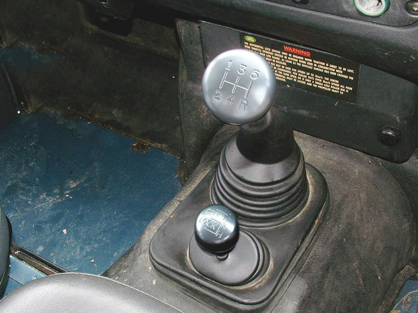 Britpart Alloy Main Gear & Transfer Gear Lever Set for Defender (1995-2006) with R380 Gearbox, showing the gear and transfer lever set inside a Land Rover Defender vehicle.