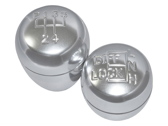 Britpart Alloy Gear Lever Knob Set LT77 for Defender, silver gear shift knob set for manual transmission with engraved shift pattern and four-wheel drive control symbols.