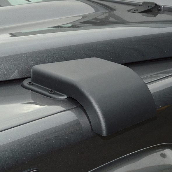 Britpart Snow Cowl Right Hand Drive for Defender, a black protective hood ornament cover on the front of a vehicle.