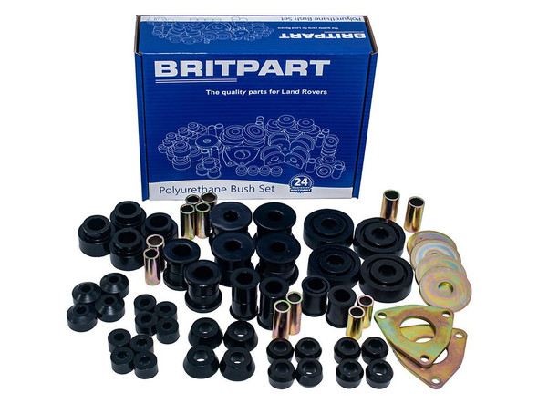 Britpart Polyurethane Suspension Bush Set for Defender 2007-2009, image showing black polyurethane bushings, metal sleeves, and mounting plates displayed with blue Britpart packaging.