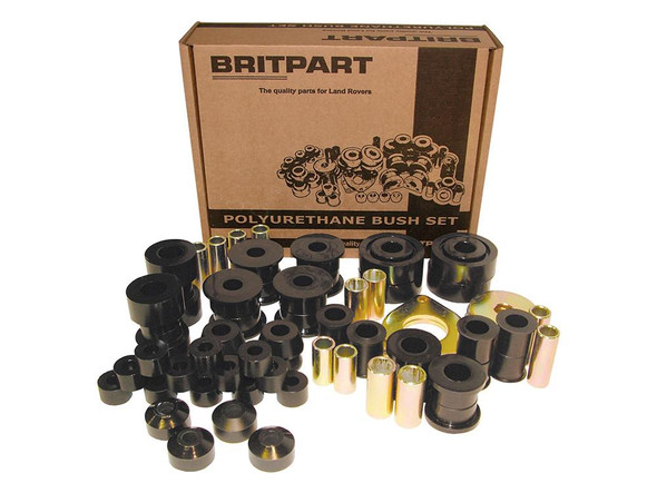Britpart Polyurethane Suspension Bush Kit for Defender 1999-2007, black and gold bushings with a cardboard box featuring product information and illustrations. Britpart Polyurethane Suspension Bush Kit for Defender 1999-2007, black and gold bushings with a cardboard box featuring product information and illustrations.