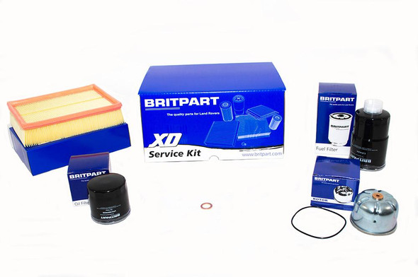 Britpart XD Service Kit with Short Main Oil Filter for Easier Changing, product image showing car maintenance parts including oil filter, fuel filter, air filter, and other components for Defender and Discovery 2 TD5 models.
