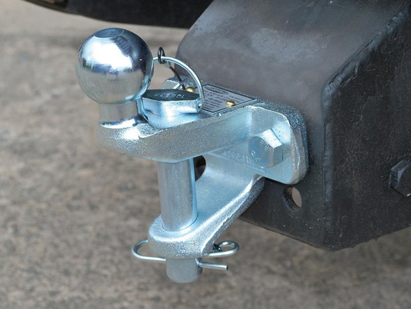 DIXON BATE Dixon Bate 3.5 Ton Tow Ball Jaw And Pin Towing Hitch, close-up of a heavy-duty metallic towing hitch with a chrome tow ball on black surface. DIXON BATE Dixon Bate 3.5 Ton Tow Ball Jaw And Pin Towing Hitch, close-up of a heavy-duty metallic towing hitch with a chrome tow ball on black surface.