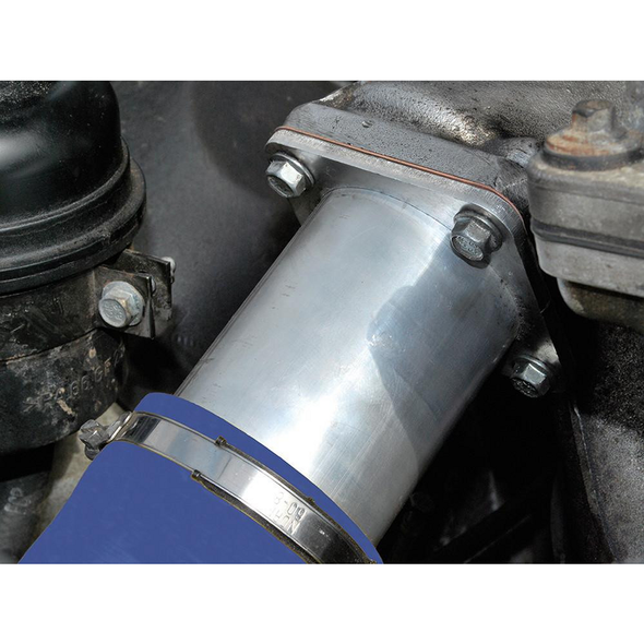 Britpart EGR Blanking Kit for Defender Td5, close-up of engine components showing the silver EGR blanking plate installed on the engine.