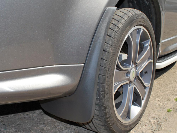 Terrafirma Rear Mud Flaps for Range Rover Sport L320, close-up of rear mud flaps protecting the wheel arch and tire from dirt and debris.