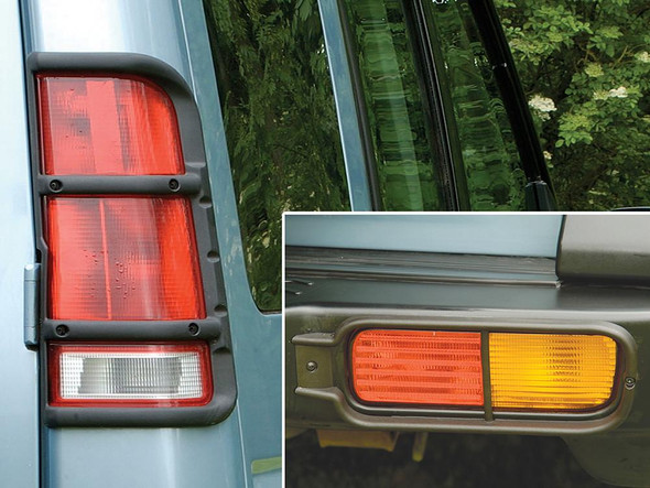 Product: Direct Replacement Rear Bumper & Rear Upper Set Lamp Guard Pair for Discovery 2, image showing rear bumper lamps guards on Discovery 2 vehicle.