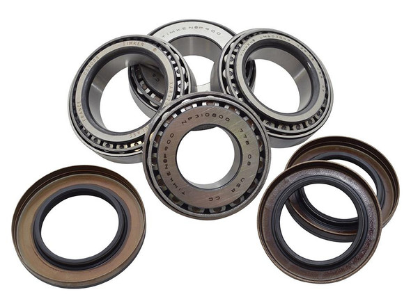 OEM Parts Range Rover Sport Front Differential Bearing Overhaul Kit, image showing a set of new and used differential bearings.