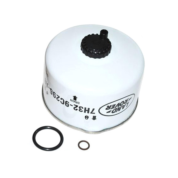 Genuine Land Rover Diesel Fuel Filter for Discovery 3, Discovery 4, and Range Rover Sport, image of a white cylindrical fuel filter with black cap and sealing O-rings.