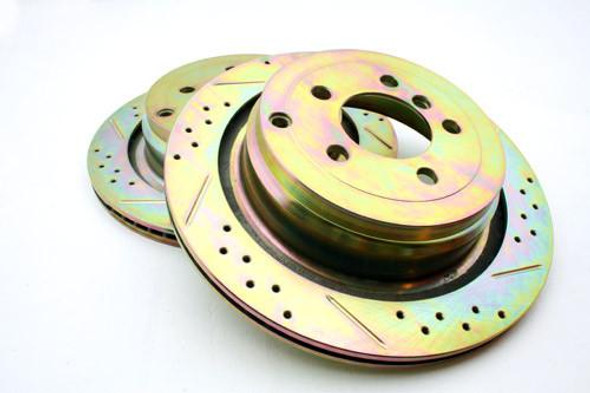 Terrafirma Rear Brake Disc for Range Rover L322, OEM LR031844, three gold-coloured brake rotors with multiple holes for venting and mounting, on a white background.