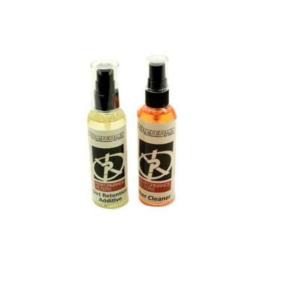 Terrafirma Performance Foam Air Filter Cleaner And Additive Kit, two spray bottles with black nozzles, one labelled 'Filter Retention Additive' and the other 'Filter Cleaner' in orange and white packaging.