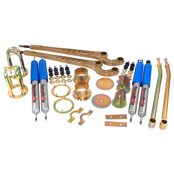 Terrafirma Pro Sport Maxi Dislocation Suspension Kit for Defender 90, Discovery 1 | TF233, image showing suspension components including shocks, control arms, bushings, and mounting hardware arranged on a plain background.