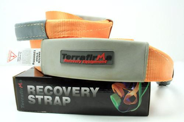Terrafirma Heavy-Duty 4x4 Recovery Snatch Strap 9m 11000Kg, front view of the recovery strap with reinforced eye loops and branding, placed on its packaging box.