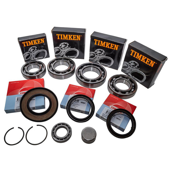 Product OEM Parts Transfer Box Rebuild Kit for Discovery 3/4 and Range Rover Sport, image showing various bearings, seals, and components with Timken and Corteco packaging for vehicle maintenance and repair.