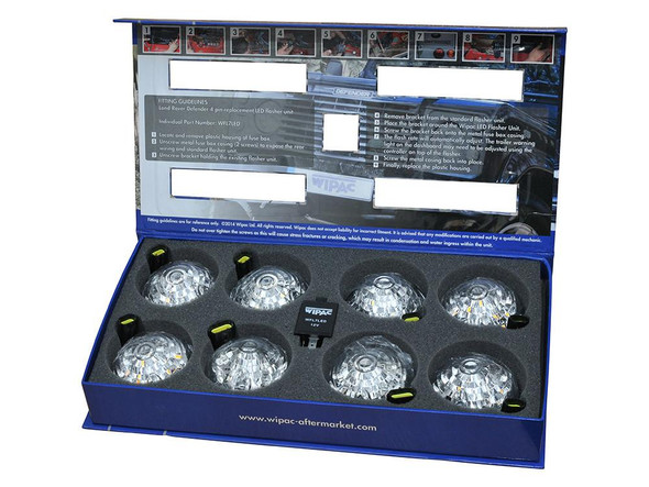 WIPAC Clear LED Lens Lamp Upgrade Kit 73mm Lens for Defender, product packaging with multiple LED lamps and installation instructions.