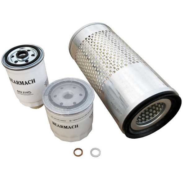 Direct Replacement Engine Service Filter Kit Oil Air Fuel for Defender 300TDi, including oil, air, and fuel filters with metal and plastic components.