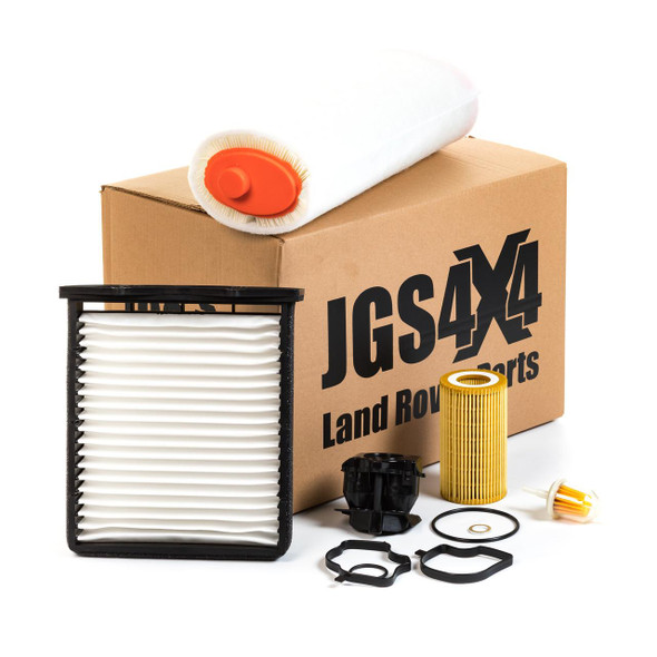 Direct Replacement Engine Service Filter Kit With Modified Crankcase Oil Breather for Freelander 1 Td4, shown with various filters and components on a white background. Direct Replacement Engine Service Filter Kit With Modified Crankcase Oil Breather for Freelander 1 Td4, shown with various filters and components on a white background.