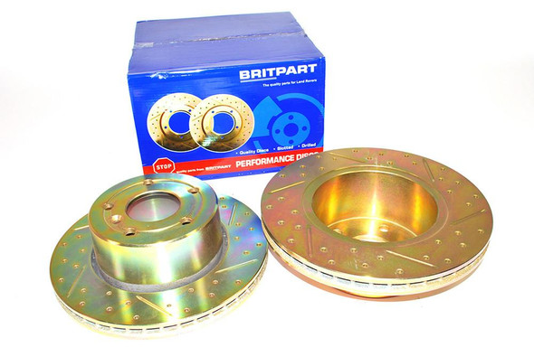 Britpart Front Vented Brake Discs Drilled and Grooved Performance Upgrade for Discovery 2, image of drilled and grooved brake discs with packaging in background.