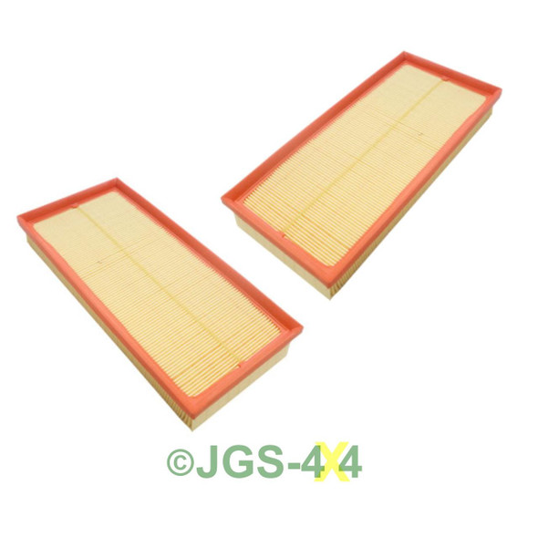 Mann & Hummel Range Rover Discovery 4 Range Rover Sport Air Filter MANN x2, two rectangular car air filters with beige pleated material and orange rubber frames.