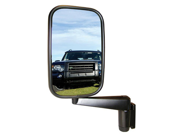 Direct Replacement Door Wing Mirrors with Arms (Pair) - MTC5217 for Defender 90/110/130, side view of vehicle mirror reflecting a black Land Rover Defender 90/110/130 in a grassy outdoor setting.